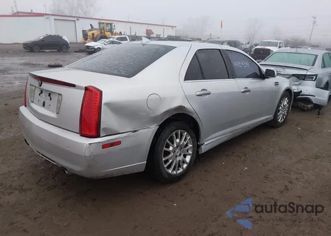 2010 Cadillac Sts Luxury Package z USA, uszkodzony, nr VIN 1G6DU6EV2A0145932